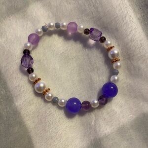 purple string bracelet